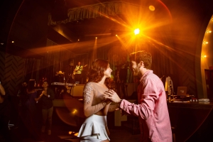 couple dancing at a bar